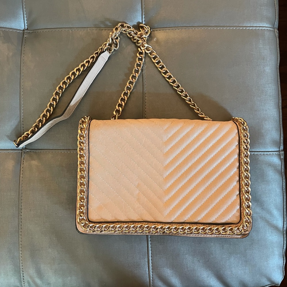 Nude purse with gold chain detail